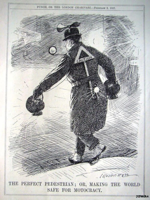 The Perfect Pedestrian circa 1927Cartoon of a man carrying two large lamps, one in each hand. He also has a light attached to the back of his belt and a triangular caution sign on his back and a rear-view mirror attached to his shoulder.